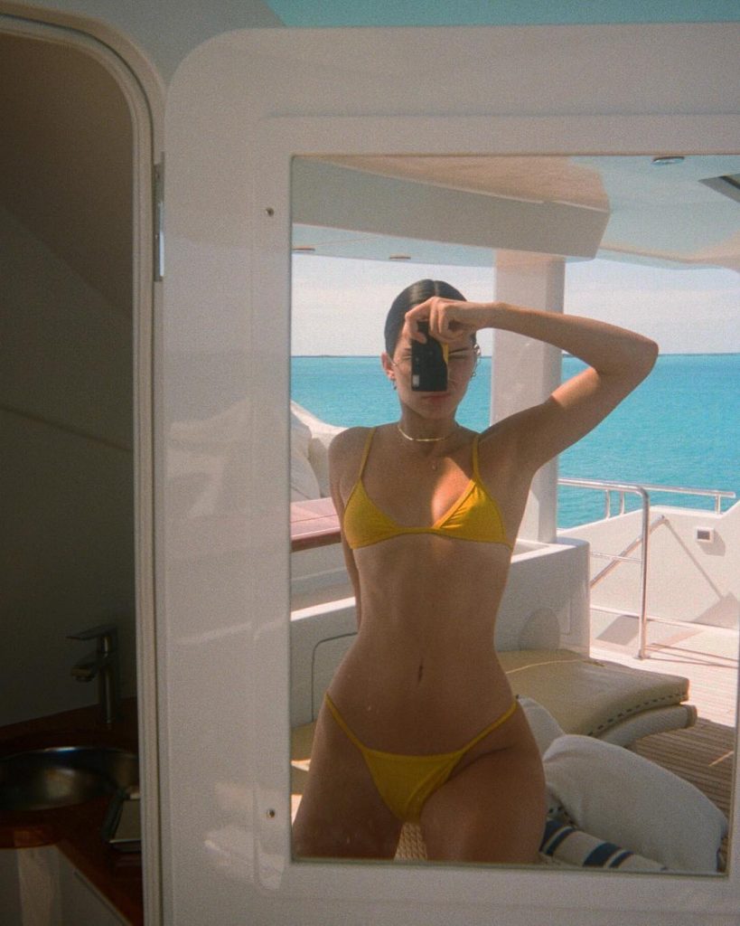 Kendall Jenner went Old School with her Camera and Little Yellow Bikini